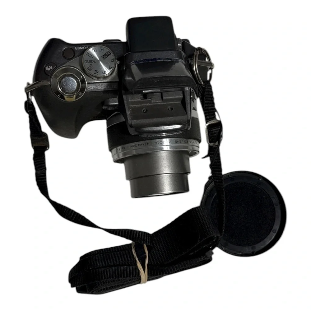 Olympus Black Digital Camera with Lens and Strap